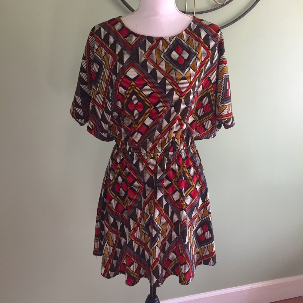 Francesca’s Bird Cage Label Dress